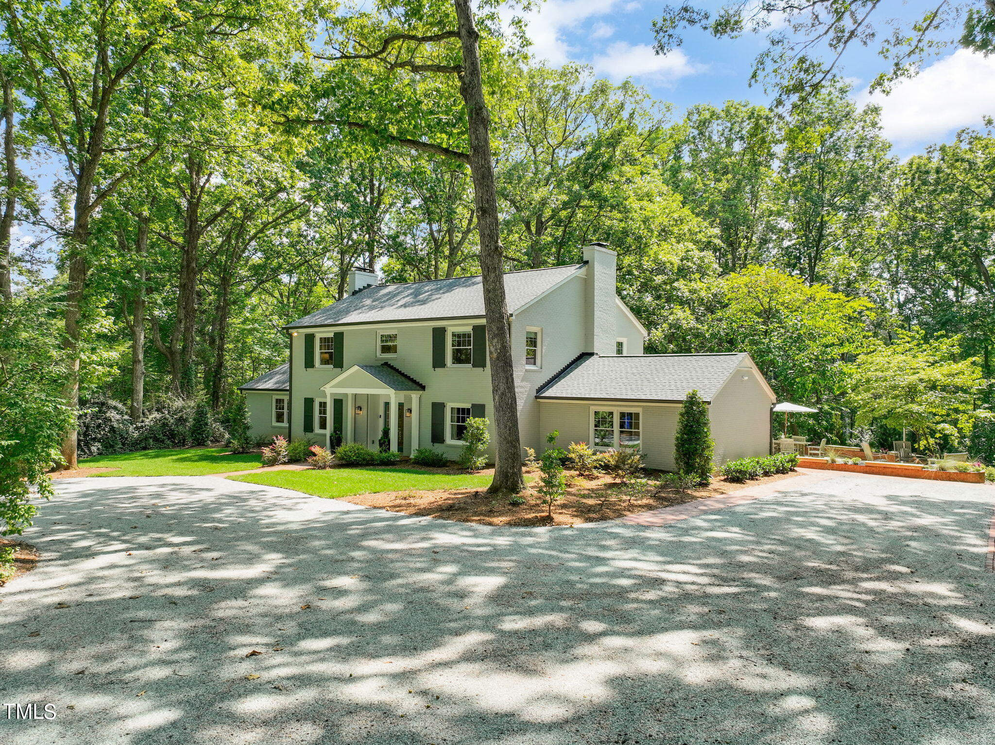4604 Timberly Drive Durham, NC 27707 - Photo 52 of 60 a front view of a house with a yard