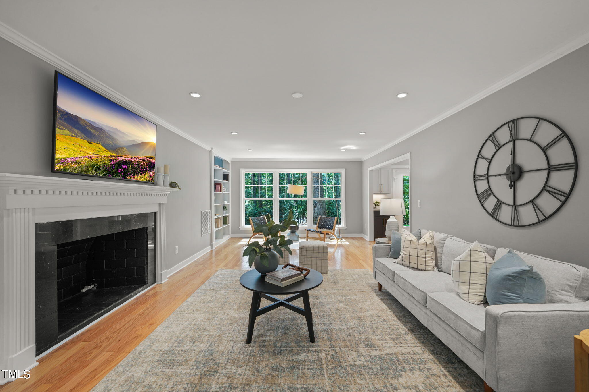 4604 Timberly Drive Durham, NC 27707 - Photo 6 of 60 a living room with furniture a window and a fireplace