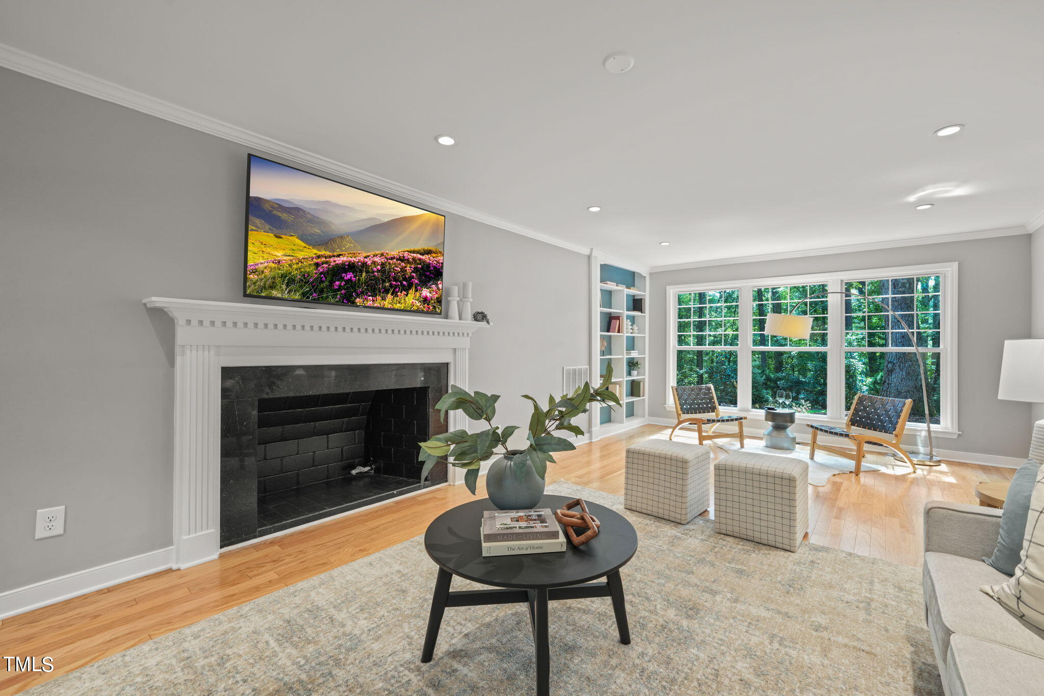4604 Timberly Drive Durham, NC 27707 - Photo 7 of 60 a living room with furniture and a fireplace