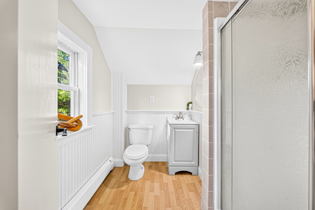 24 Miller Road Wilmington, MA 01887 - Photo 30 of 40 a bathroom with a sink and a mirror