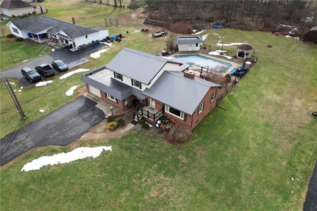 942 Cleland Mill Road New Castle, PA 16102 - Photo 39 of 41 an aerial view of a house with garden space and street view