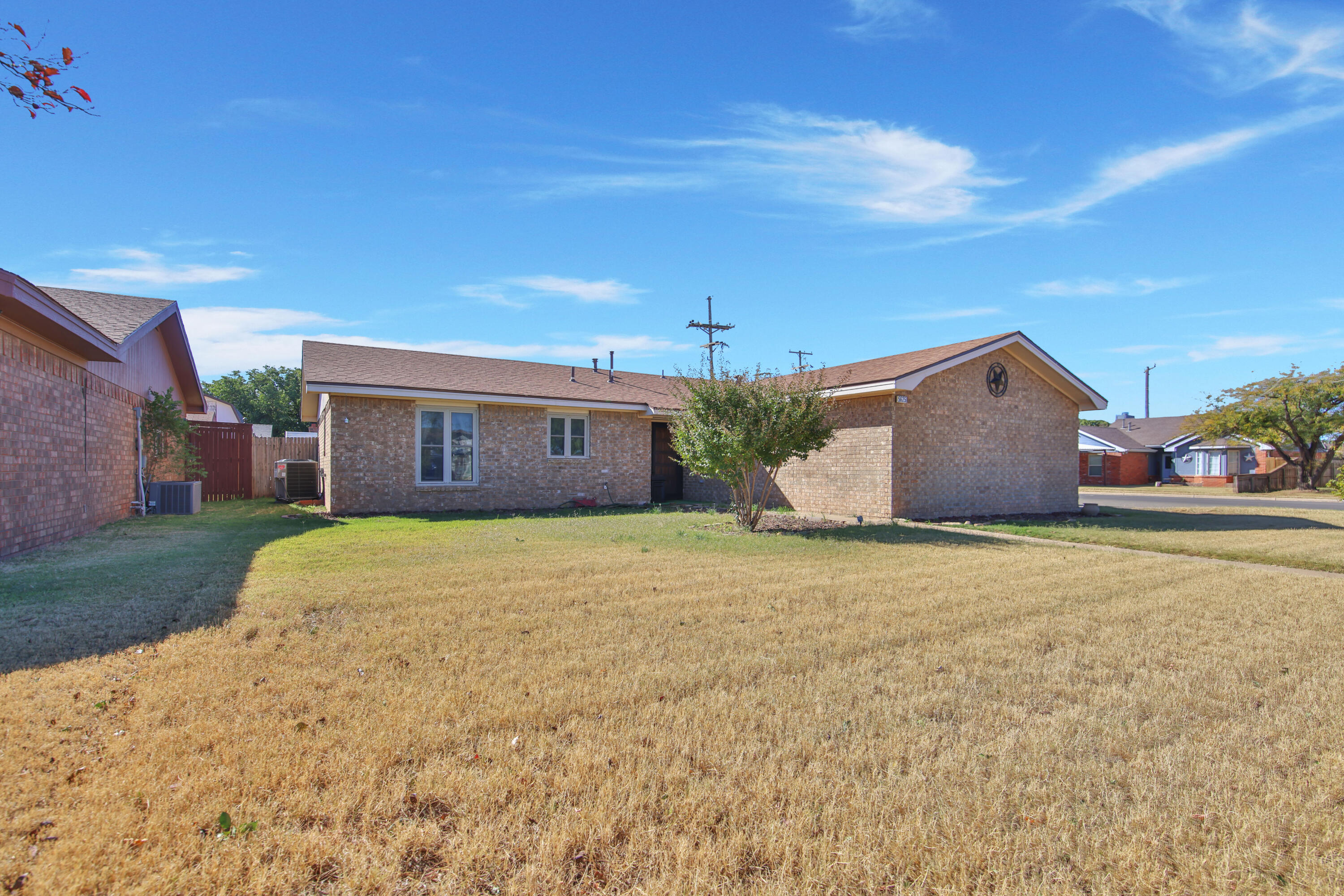5625 Amherst Street Lubbock, TX 79416 - Photo 1 of 32 a house view with a garden space