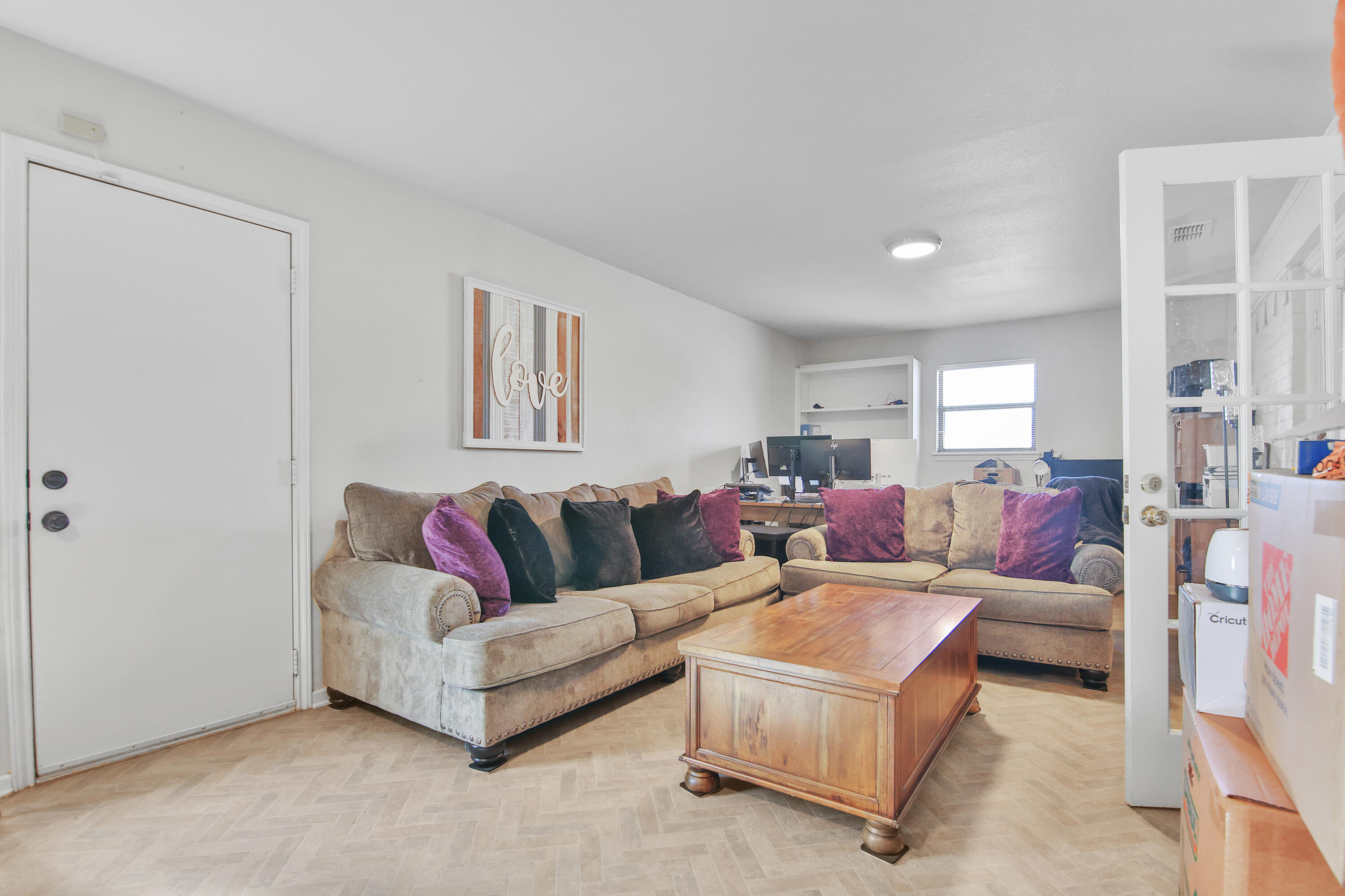 5625 Amherst Street Lubbock, TX 79416 - Photo 27 of 32 a living room with furniture and a large window