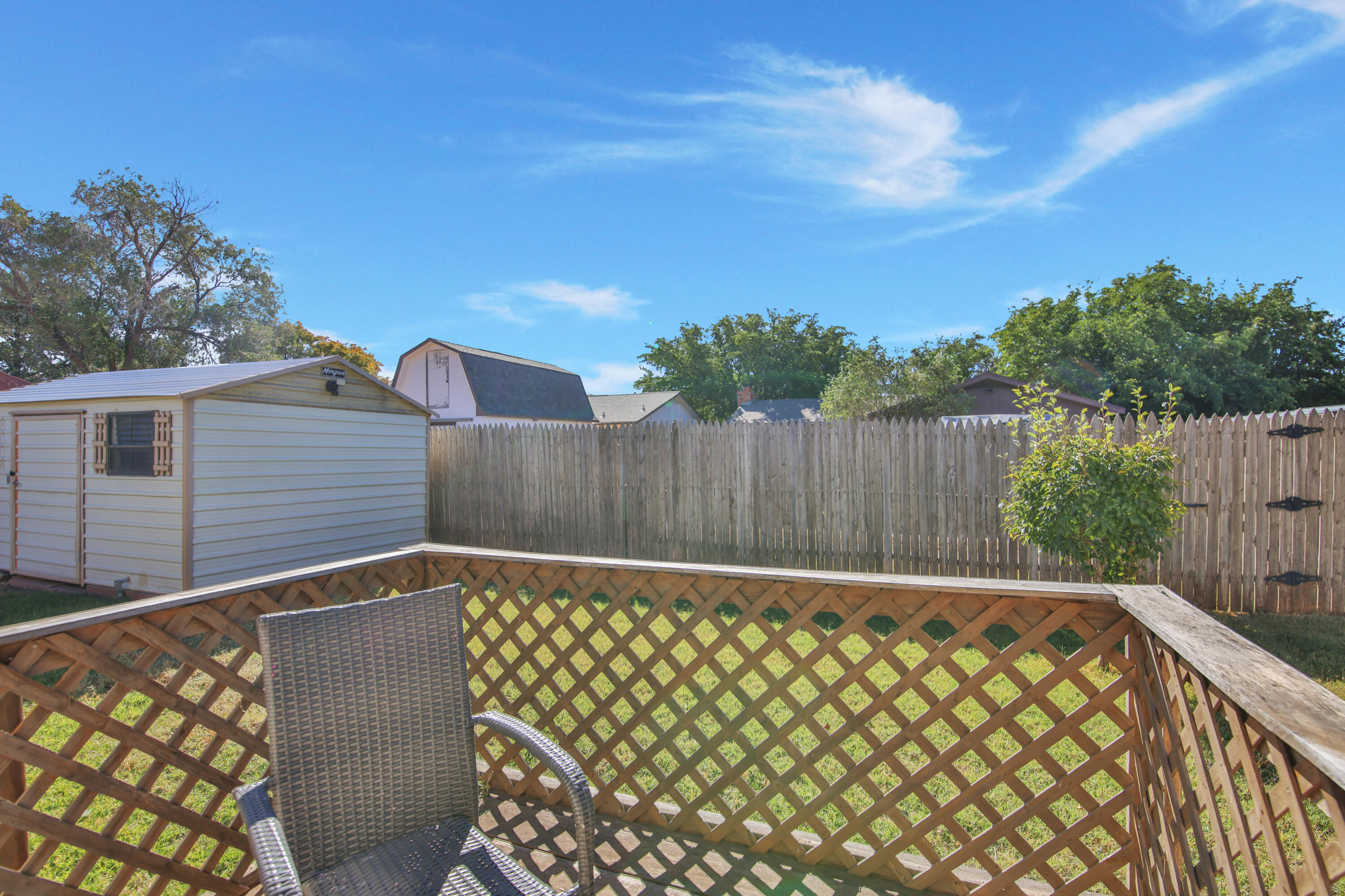 5625 Amherst Street Lubbock, TX 79416 - Photo 29 of 32 a view of wooden fence and trees