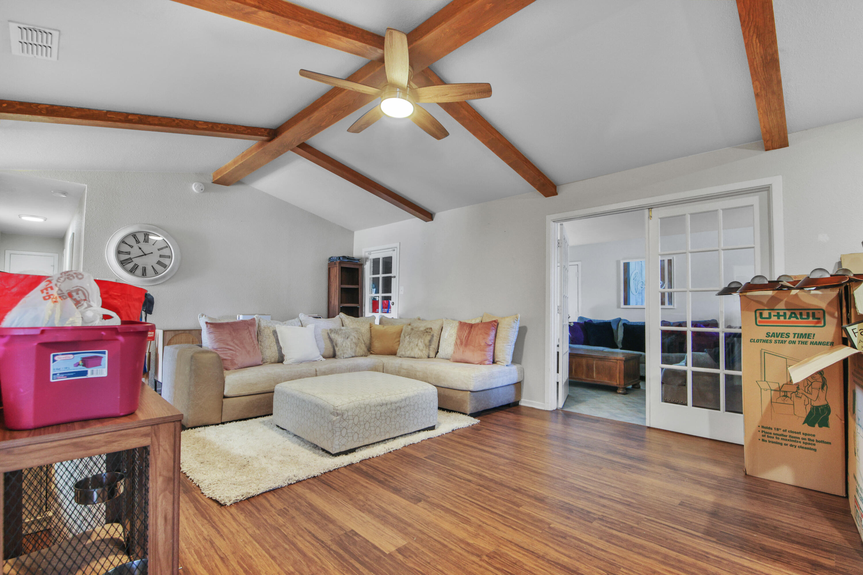 5625 Amherst Street Lubbock, TX 79416 - Photo 10 of 32 a living room with furniture and a wooden floor