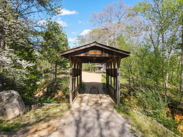 a view of a porch with wooden floor and outer view