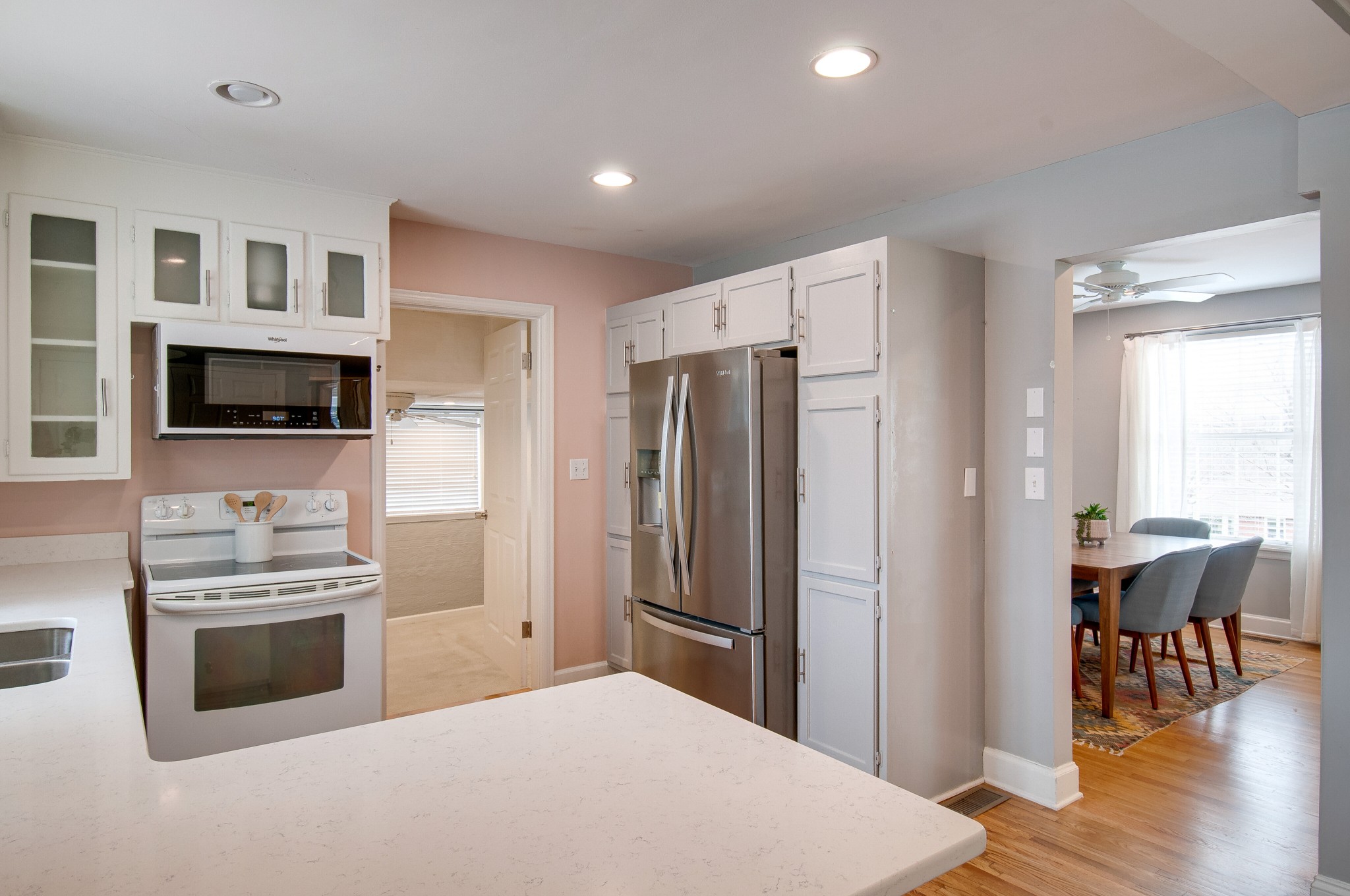 918 Mitchell Road Nashville, TN 37206 - Photo 12 of 34 a kitchen with stainless steel appliances a refrigerator stove and microwave