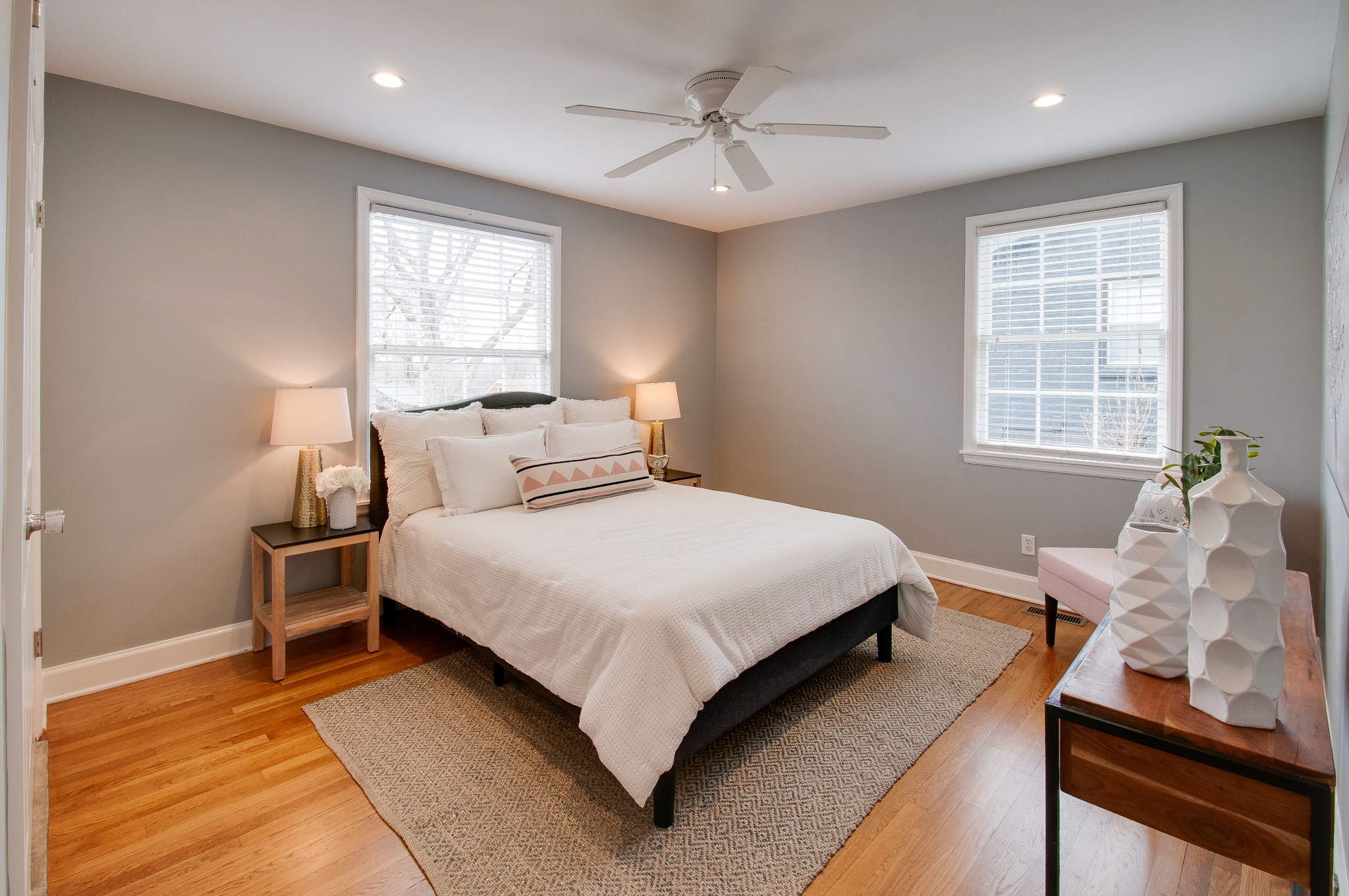 918 Mitchell Road Nashville, TN 37206 - Photo 20 of 34 a bedroom with a bed and wooden floor