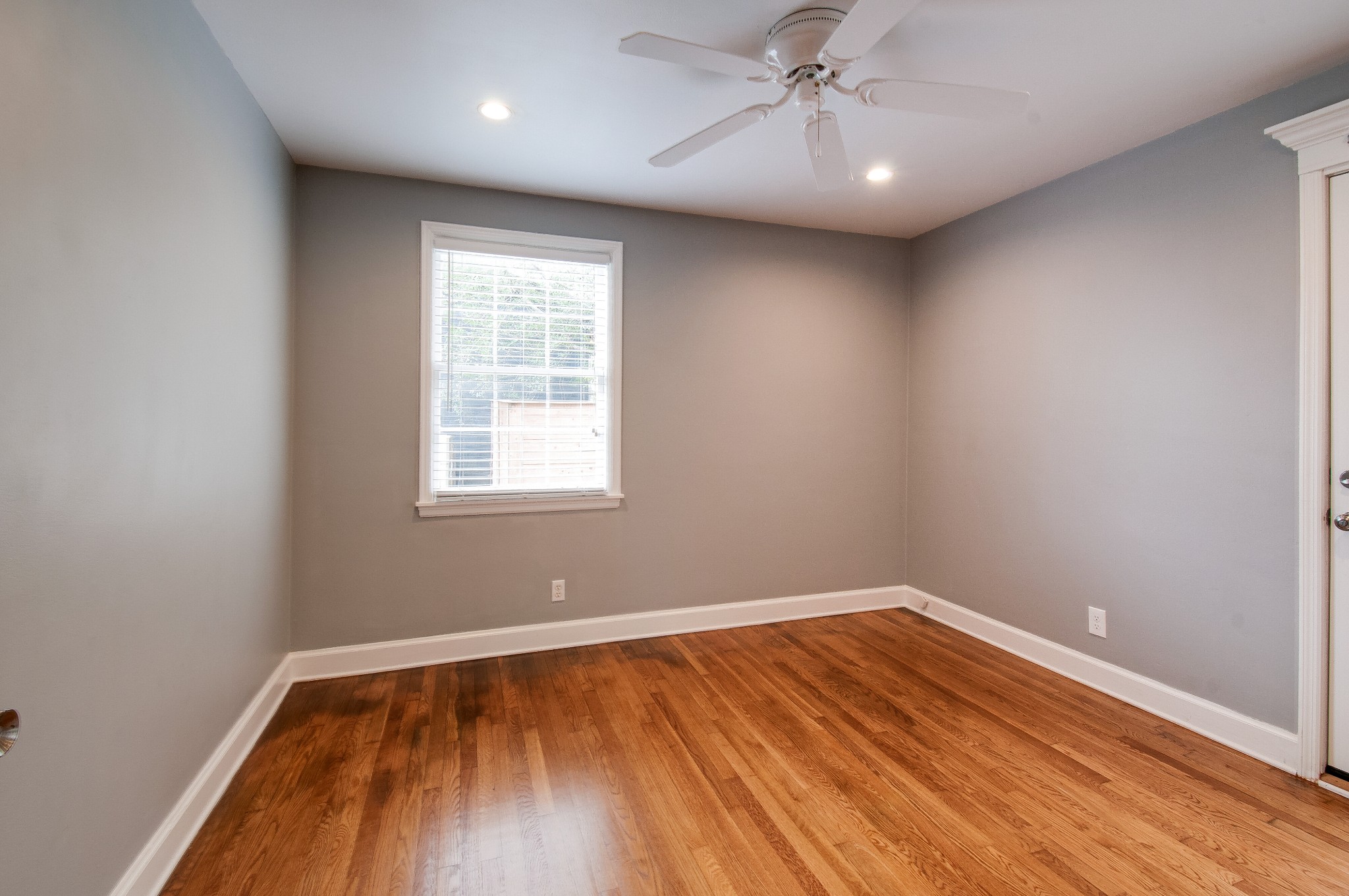 918 Mitchell Road Nashville, TN 37206 - Photo 23 of 34 wooden floor in an empty room with a window