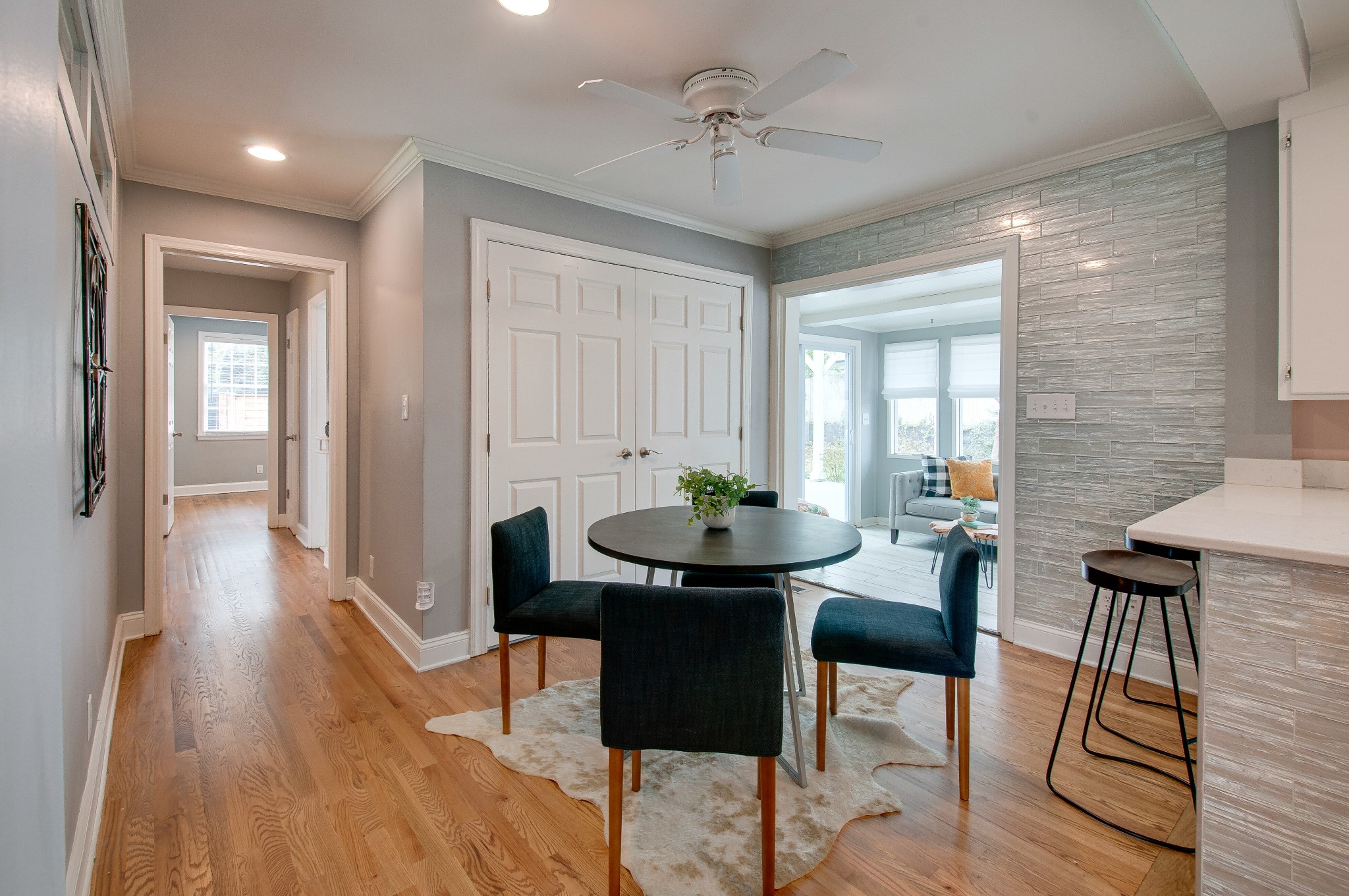 918 Mitchell Road Nashville, TN 37206 - Photo 9 of 34 a view of a dining room with furniture and wooden floor