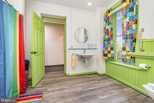 a room with toys and wooden floor