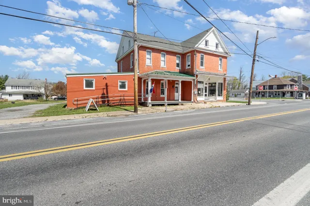 a view of a building with a street