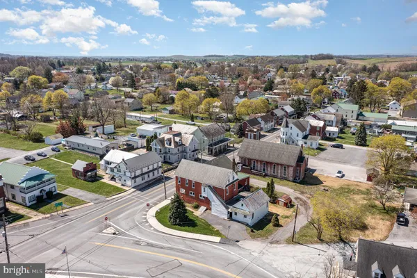 a view of a city with lawn chairs