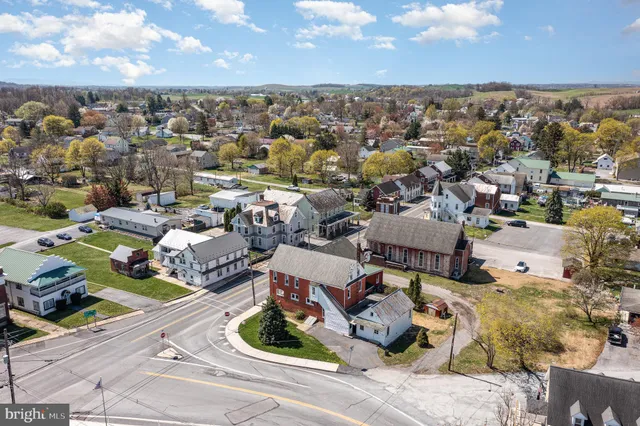 a view of a city with lawn chairs