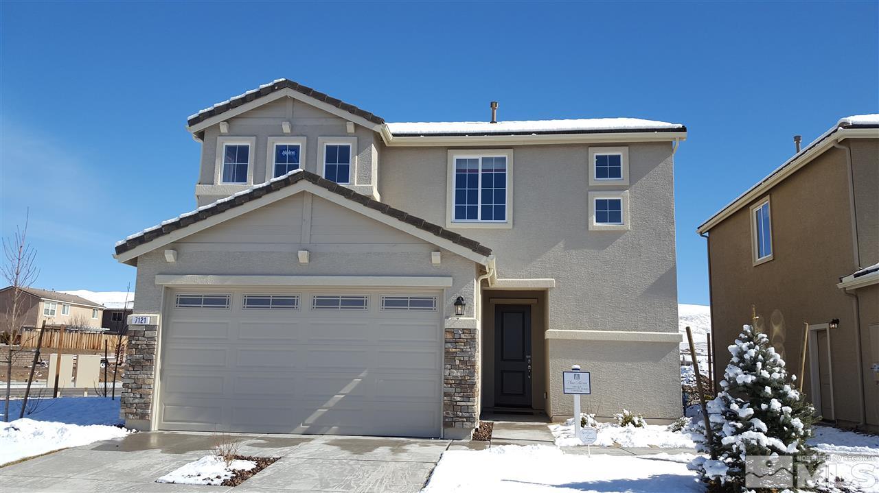 2200 Symphony Way Reno, NV 89521 - Photo 1 of 4 a front view of a house with a yard