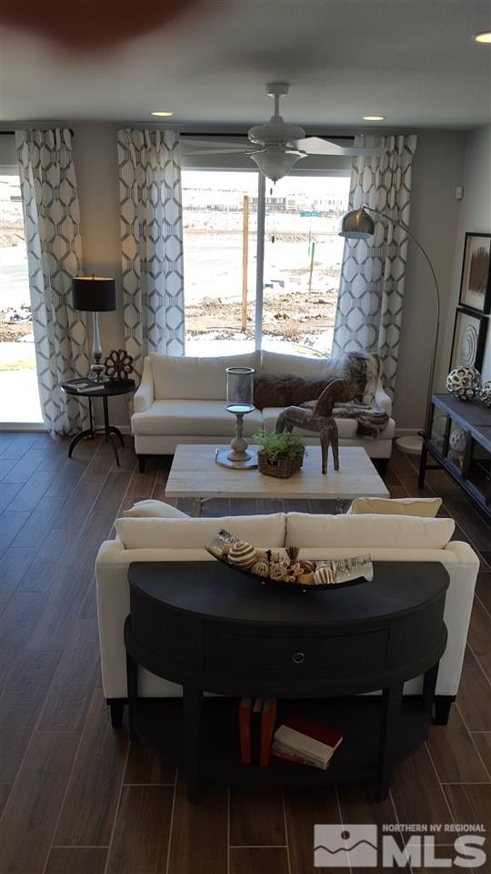 2200 Symphony Way Reno, NV 89521 - Photo 3 of 4 a living room with furniture and a fireplace