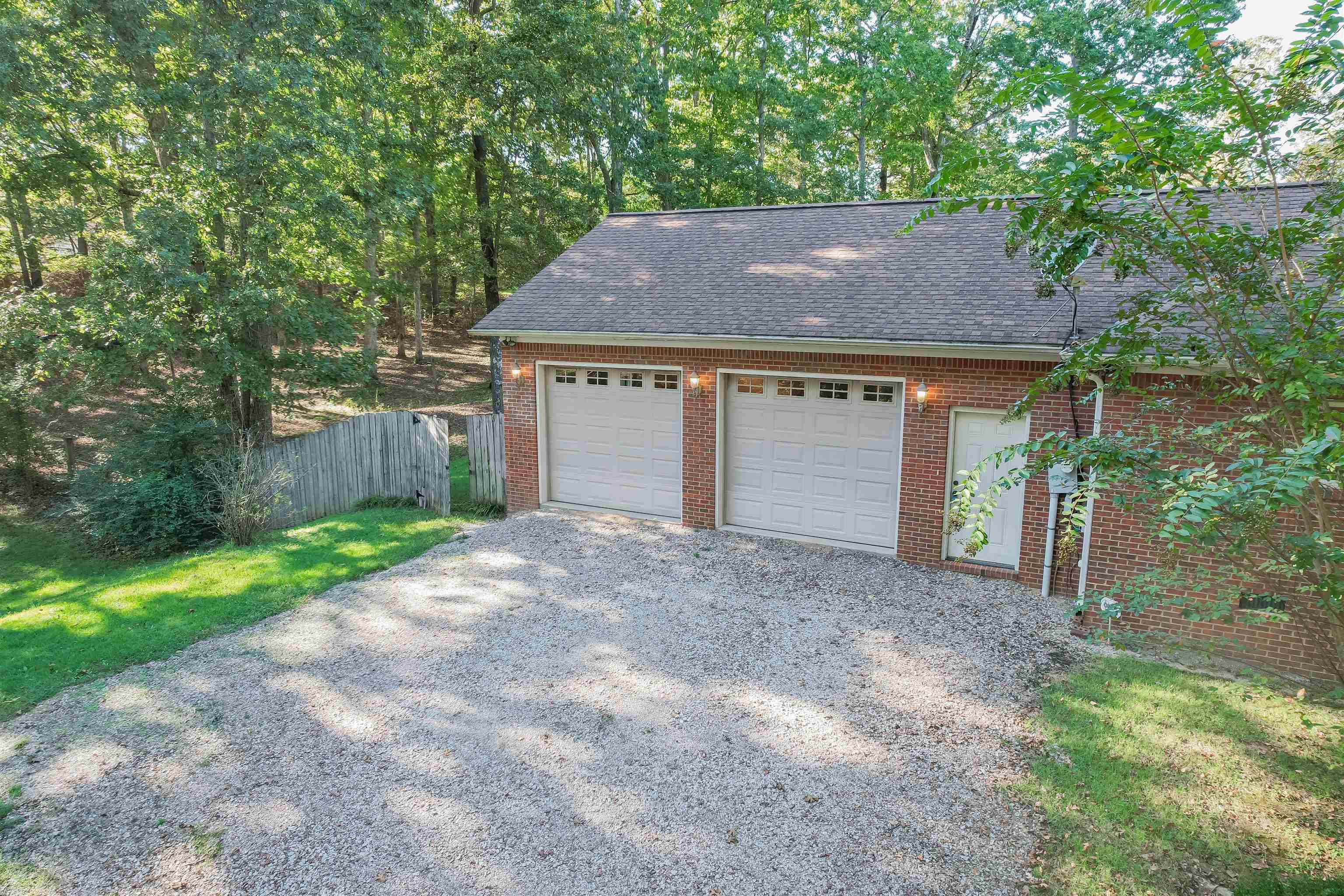 31 Timber Lane Selmer, TN 38375 - Photo 14 of 29 a front view of house with a yard and garage
