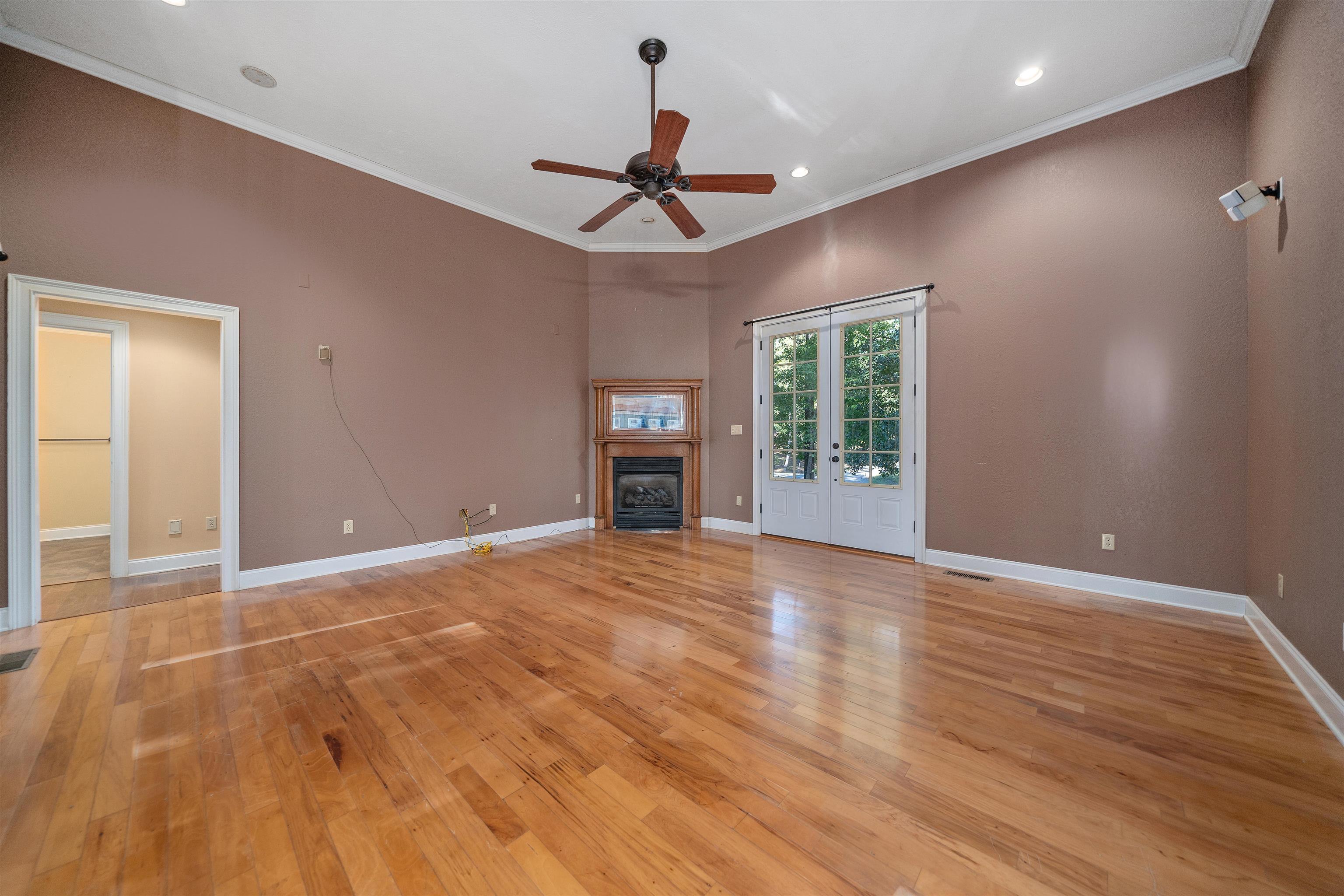 31 Timber Lane Selmer, TN 38375 - Photo 15 of 29 a view of an empty room with a window and fireplace