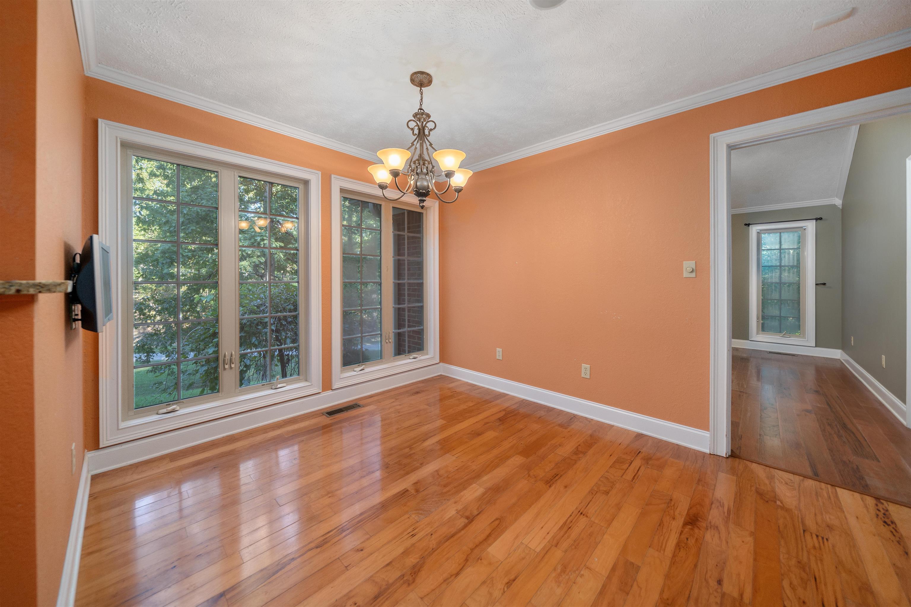 31 Timber Lane Selmer, TN 38375 - Photo 18 of 29 a view of an empty room with wooden floor and a window