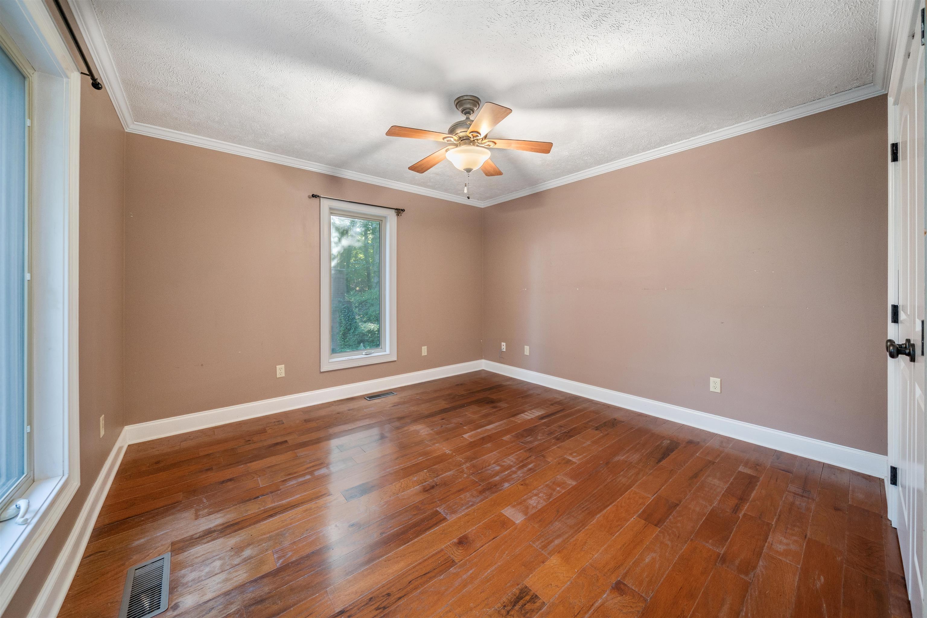 31 Timber Lane Selmer, TN 38375 - Photo 29 of 29 wooden floor in an empty room with a window