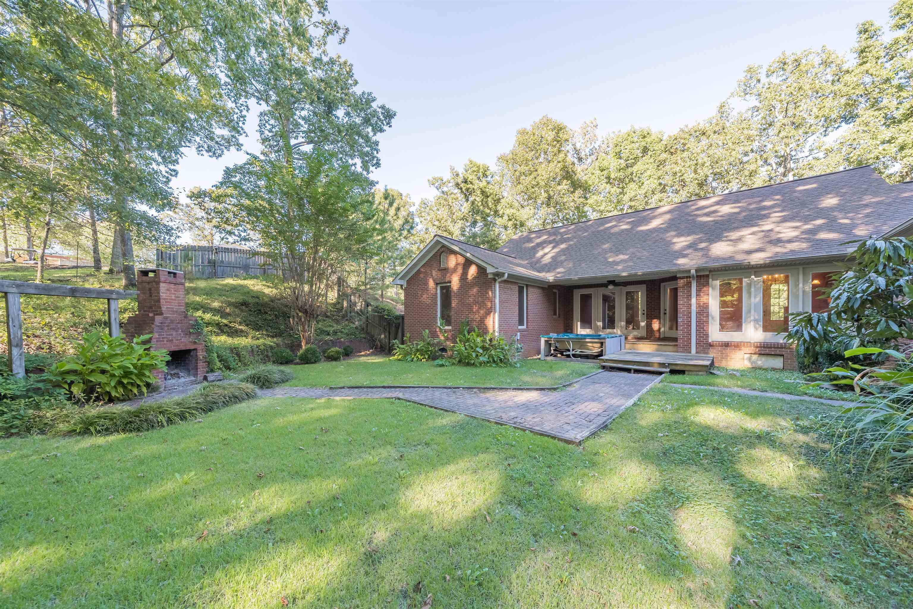 31 Timber Lane Selmer, TN 38375 - Photo 7 of 29 a front view of a house with swimming pool having outdoor seating