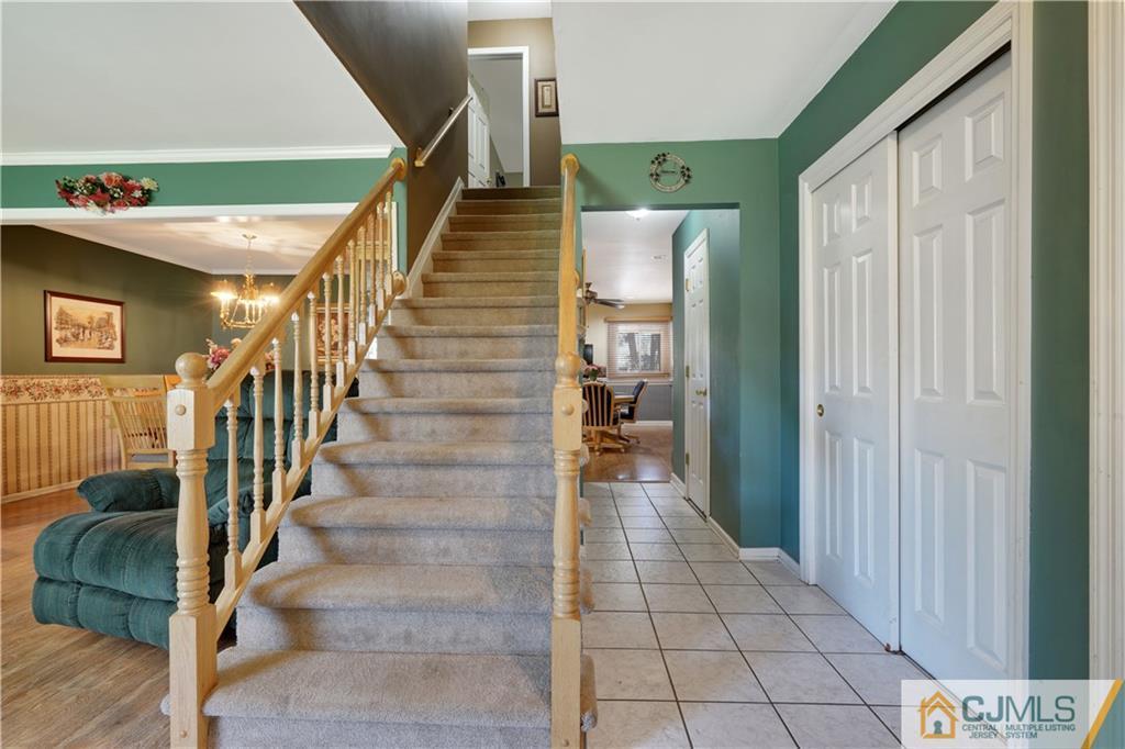 A11 Georges Road Dayton, NJ 08810 - Photo 9 of 25 a view of entryway and hall with wooden floor