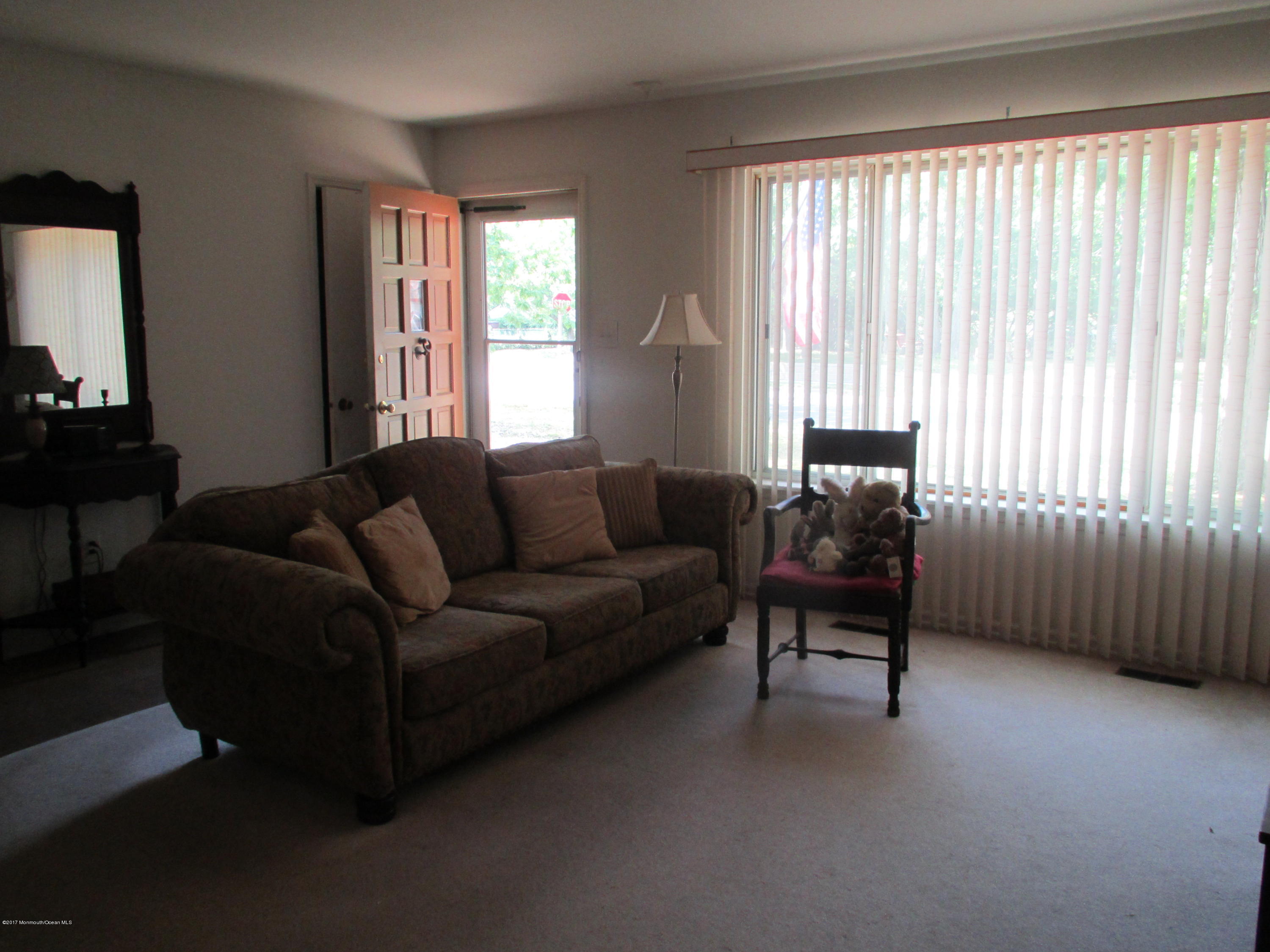 59 Korman Road Bayville, NJ 08721 - Photo 5 of 20 a living room with furniture and a window