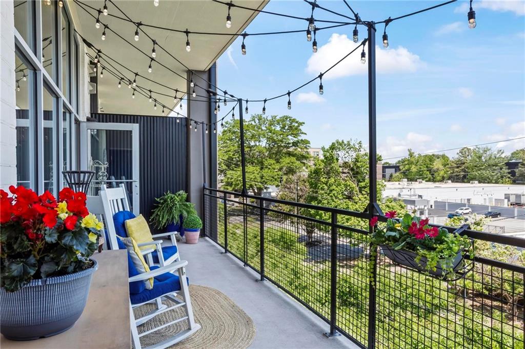 3400 Malone Drive, Unit 219 Atlanta, GA 30341 - Photo 15 of 60 a view of a porch with flowers and potted plants