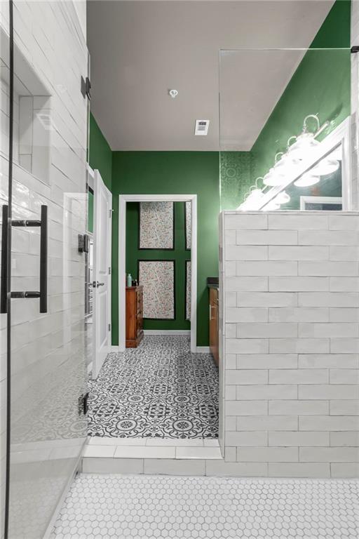 3400 Malone Drive, Unit 219 Atlanta, GA 30341 - Photo 31 of 60 a bathroom with a bathtub and a shower