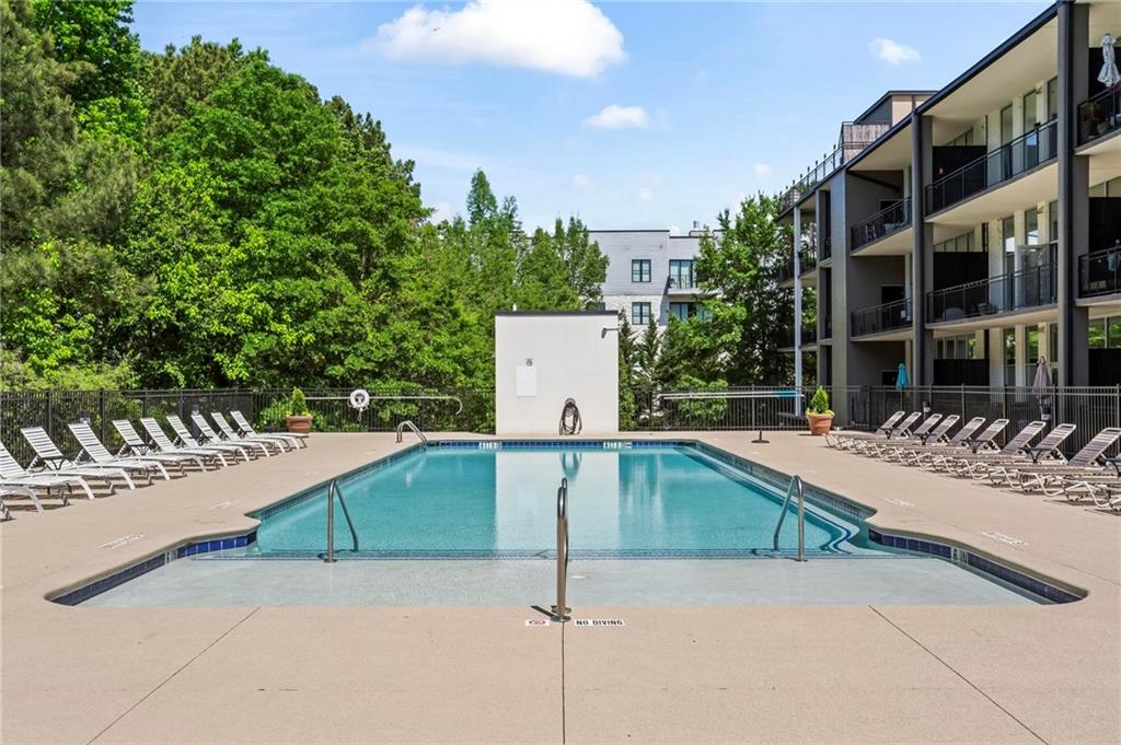 3400 Malone Drive, Unit 219 Atlanta, GA 30341 - Photo 42 of 60 a view of a patio with a table and chairs