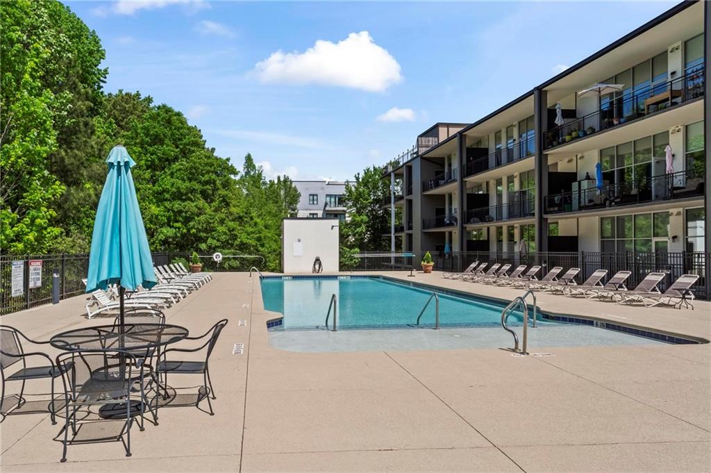 3400 Malone Drive, Unit 219 Atlanta, GA 30341 - Photo 43 of 60 a view of a house with backyard and sitting area