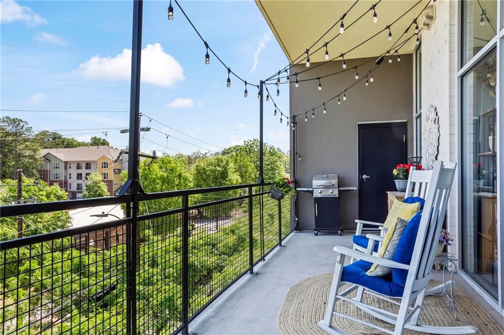 3400 Malone Drive, Unit 219 Atlanta, GA 30341 - Photo 5 of 60 a view of a balcony with chairs