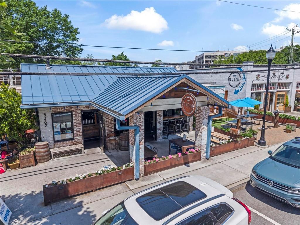 3400 Malone Drive, Unit 219 Atlanta, GA 30341 - Photo 53 of 60 a view of a house with wooden floor and outdoor seating