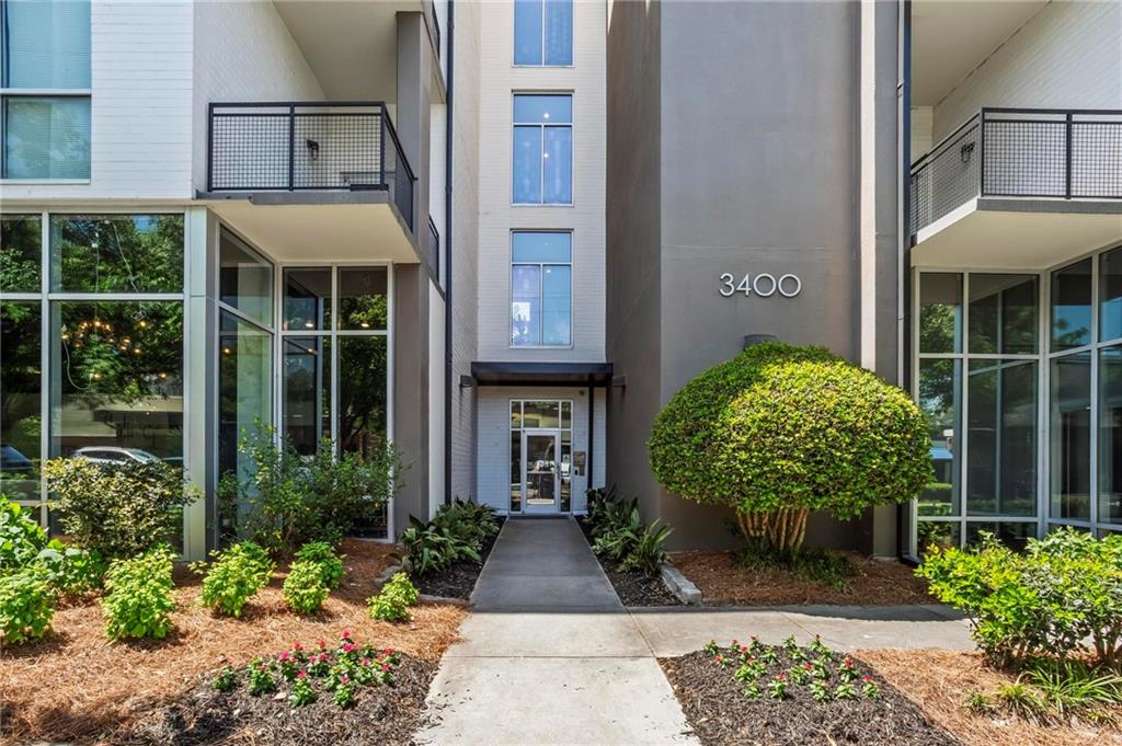 3400 Malone Drive, Unit 219 Atlanta, GA 30341 - Photo 10 of 60 a front view of a house with garden