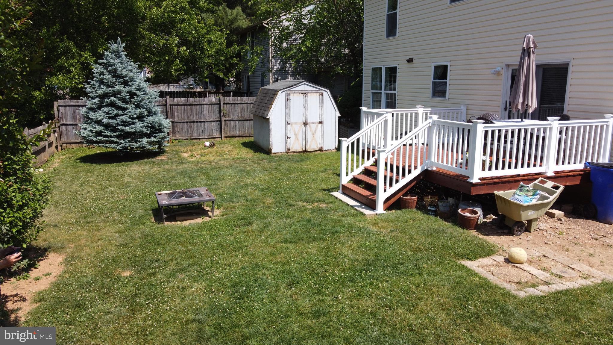 1203 Conewago Drive Frederick, MD 21702 - Photo 20 of 24 a front view of a house with garden