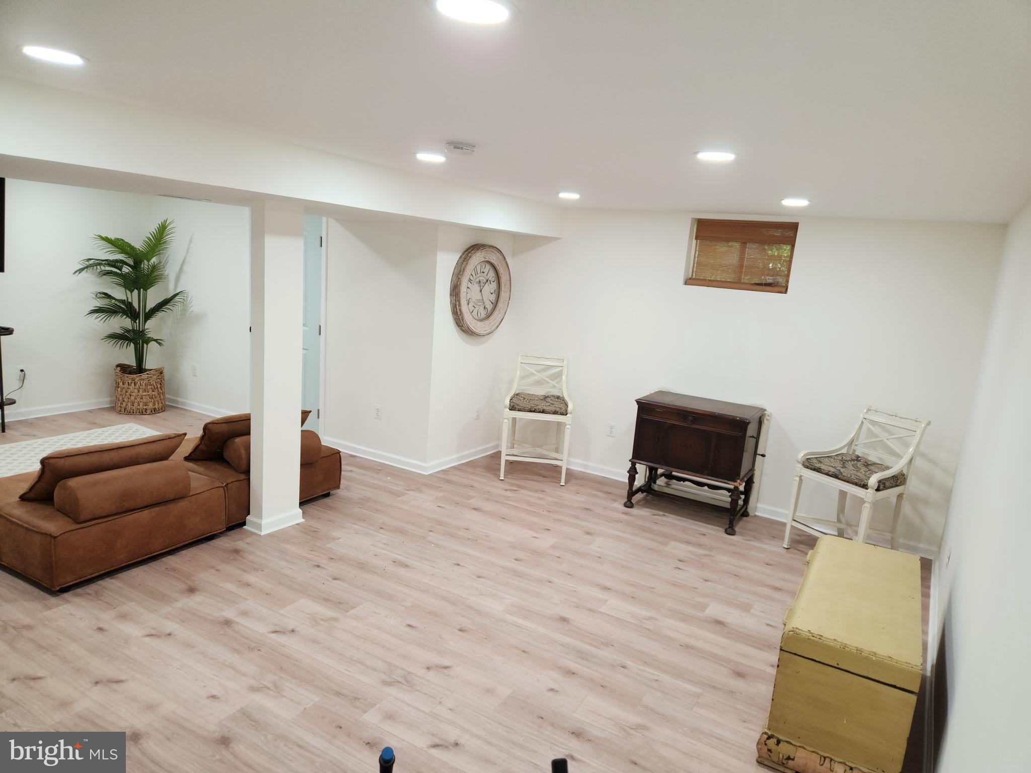 1203 Conewago Drive Frederick, MD 21702 - Photo 10 of 24 a living room with furniture and a flat screen tv