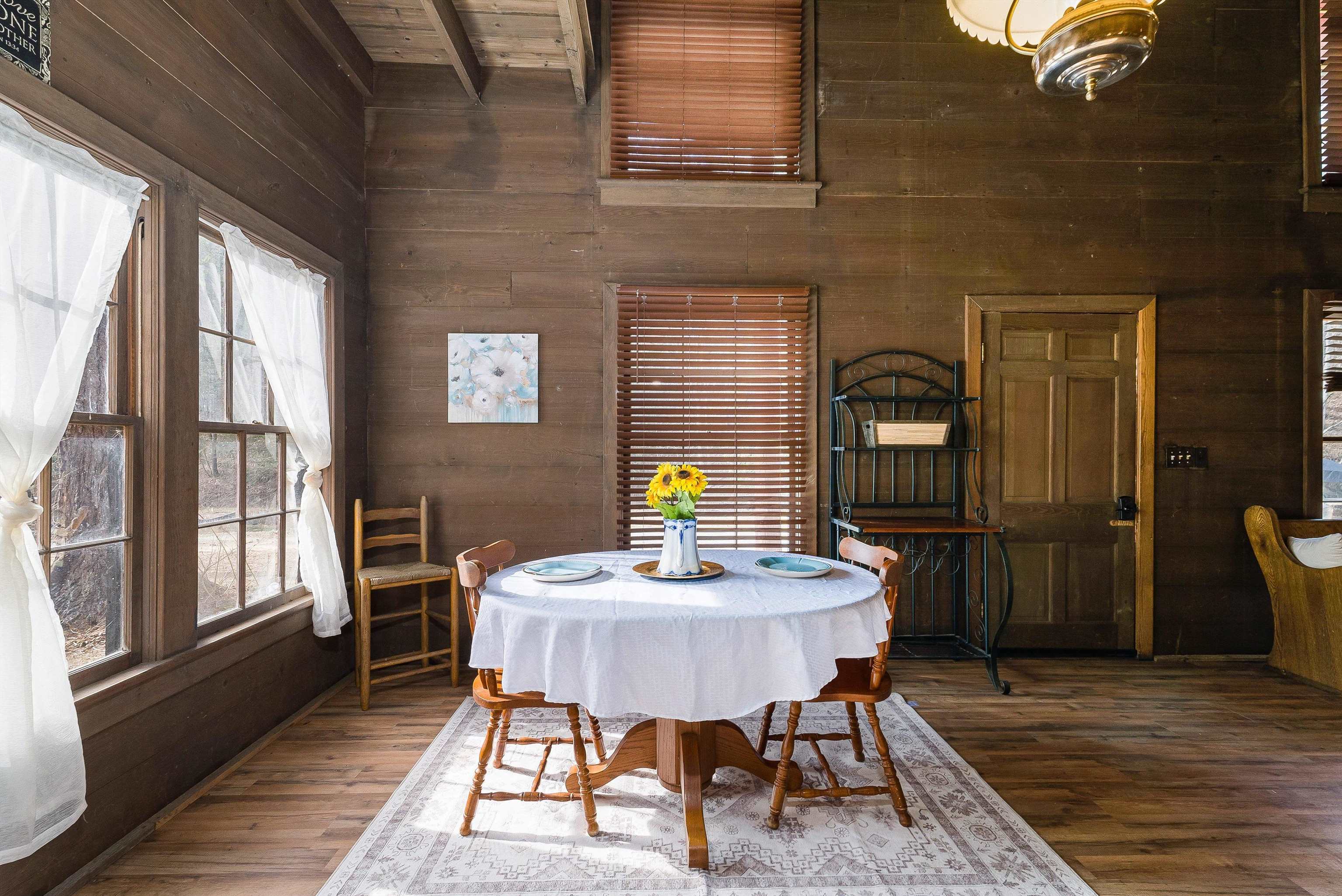 595 Deerfield Valley Road West Augusta, VA 24485 - Photo 36 of 71 a dining room with furniture and window