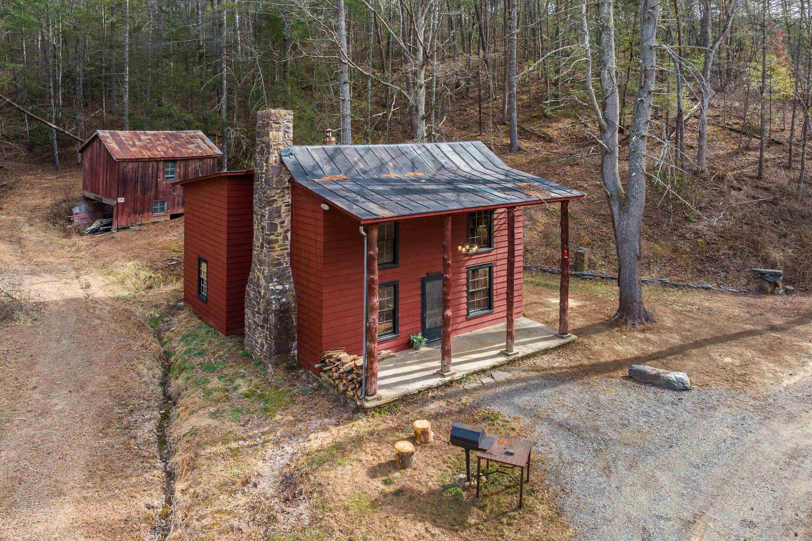 595 Deerfield Valley Road West Augusta, VA 24485 - Photo 5 of 71 a view of a backyard with a barn and a patio