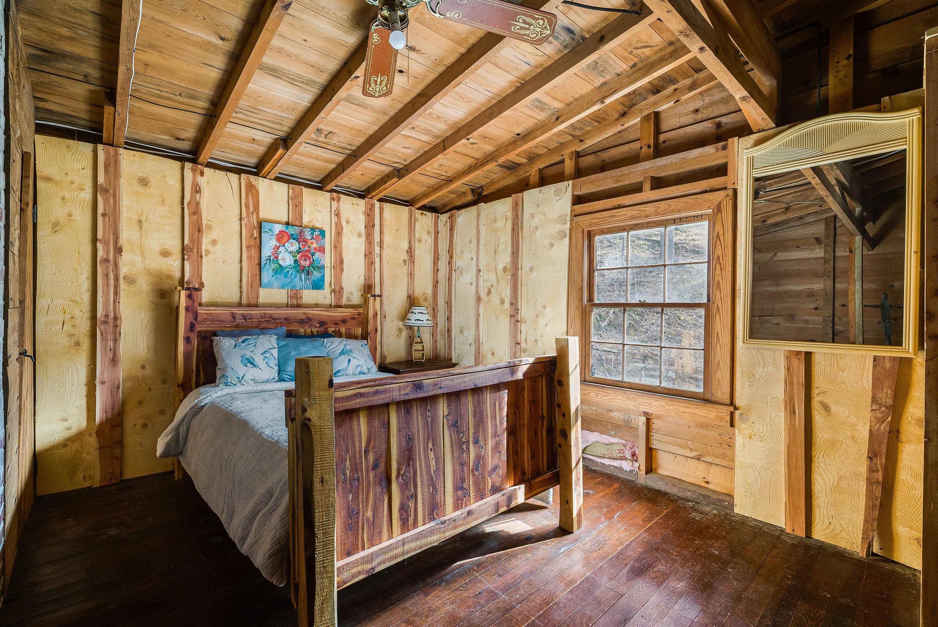 595 Deerfield Valley Road West Augusta, VA 24485 - Photo 54 of 71 a bed room with furniture and a window