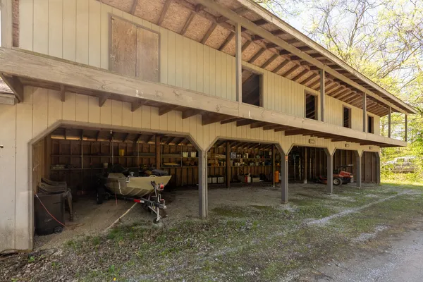 a view of a chairs and table in the house