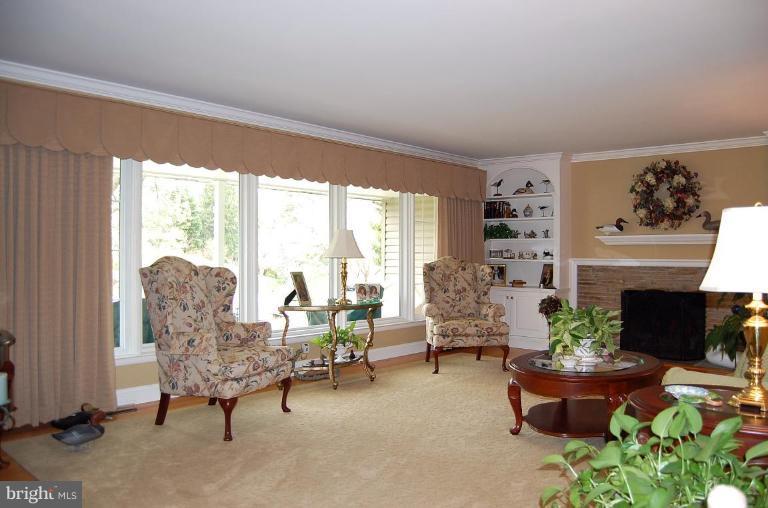 1203 Culvert Road Towson, MD 21286 - Photo 3 of 28 a living room with furniture and a fireplace