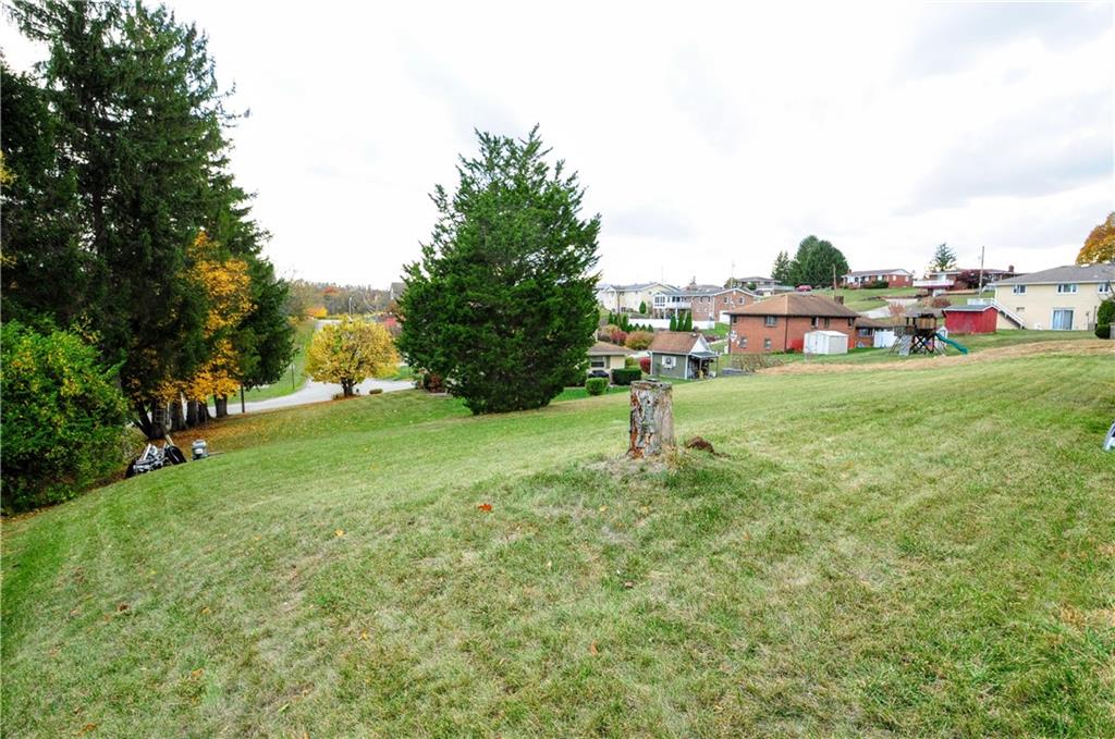 360 Ridge Avenue Monessen, PA 15062 - Photo 33 of 39 a backyard of a house with lots of green space