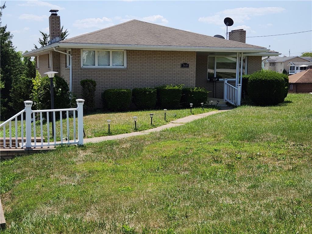360 Ridge Avenue Monessen, PA 15062 - Photo 39 of 39 a front view of a house with a yard
