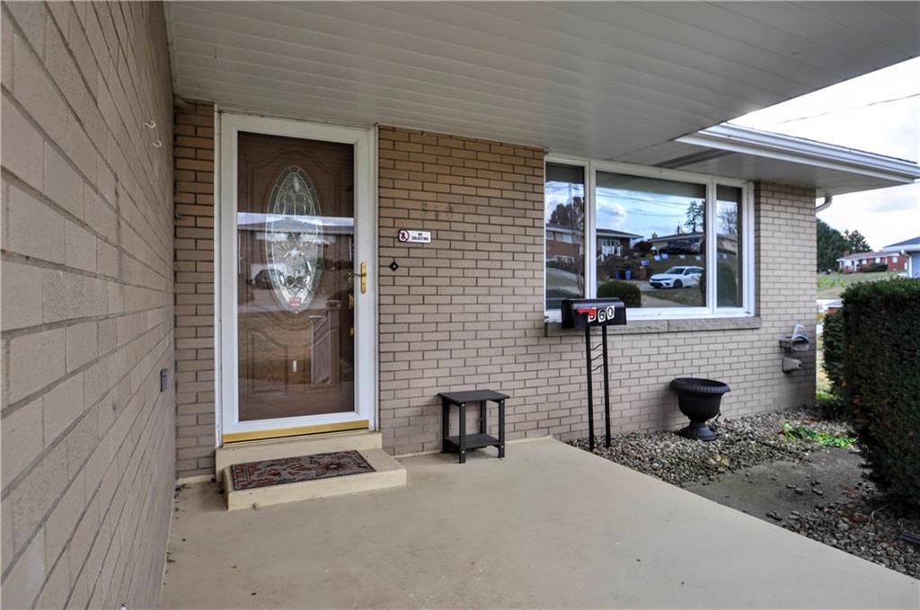 360 Ridge Avenue Monessen, PA 15062 - Photo 4 of 39 a blue and white building with glass windows