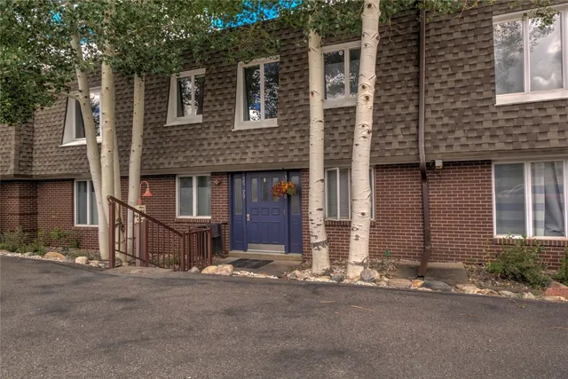 front view of a house with a street