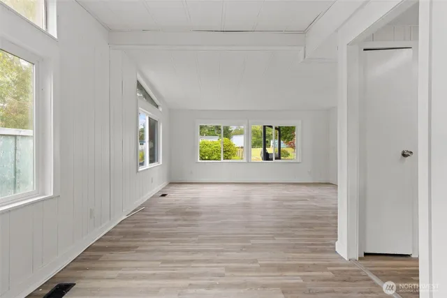 a view of an empty room and window