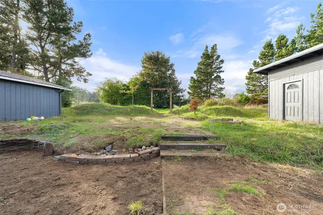 a view of backyard with green space