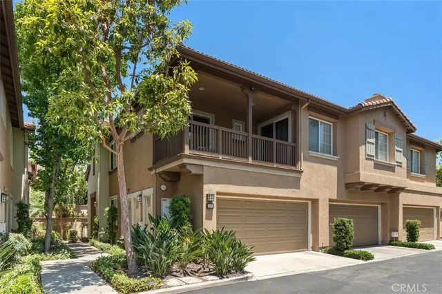 a view of house with outdoor space and street view