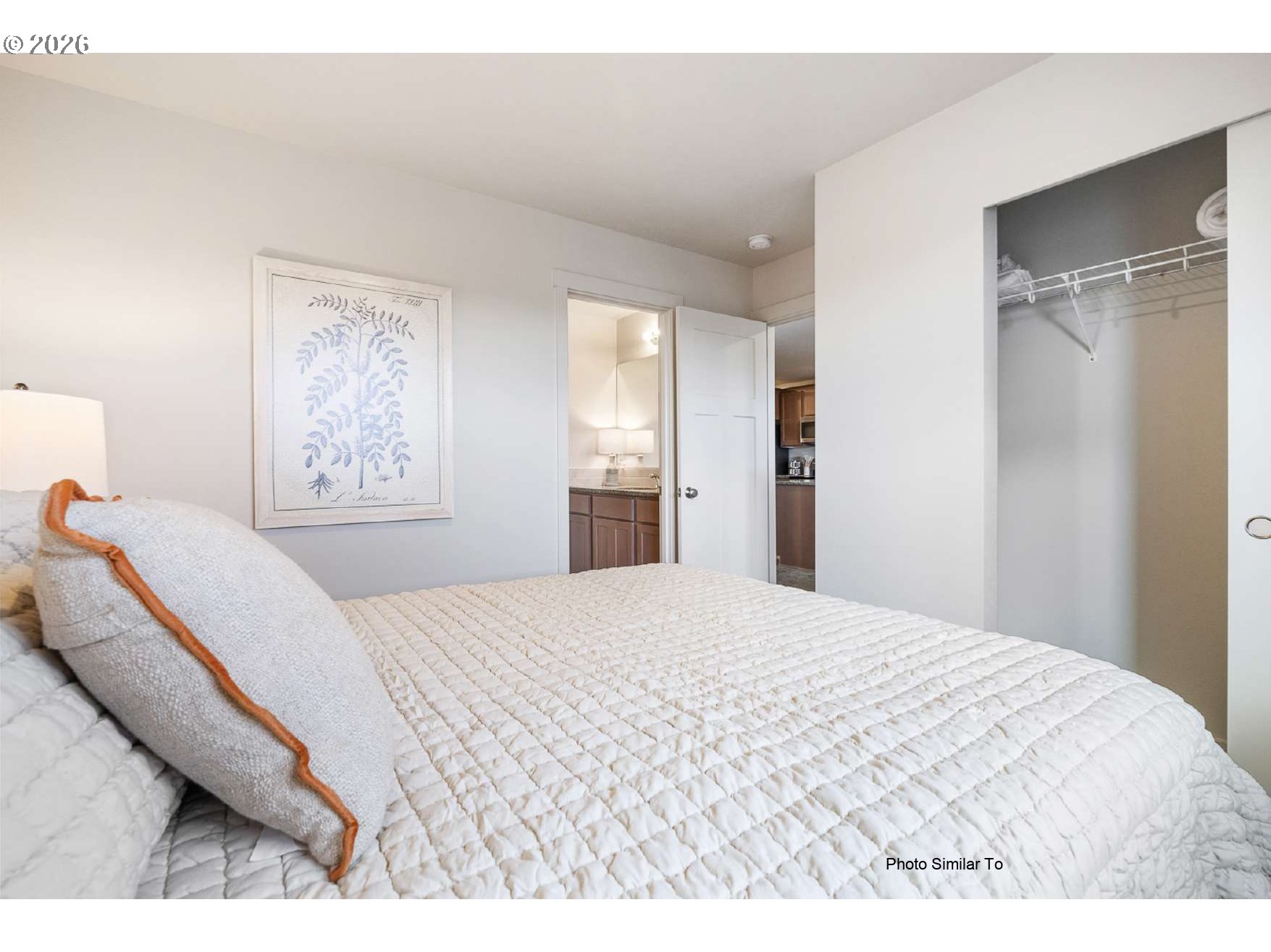 700 Jimmy Street Stanfield, OR 97875 - Photo 11 of 15 a bedroom with a large bed and a window