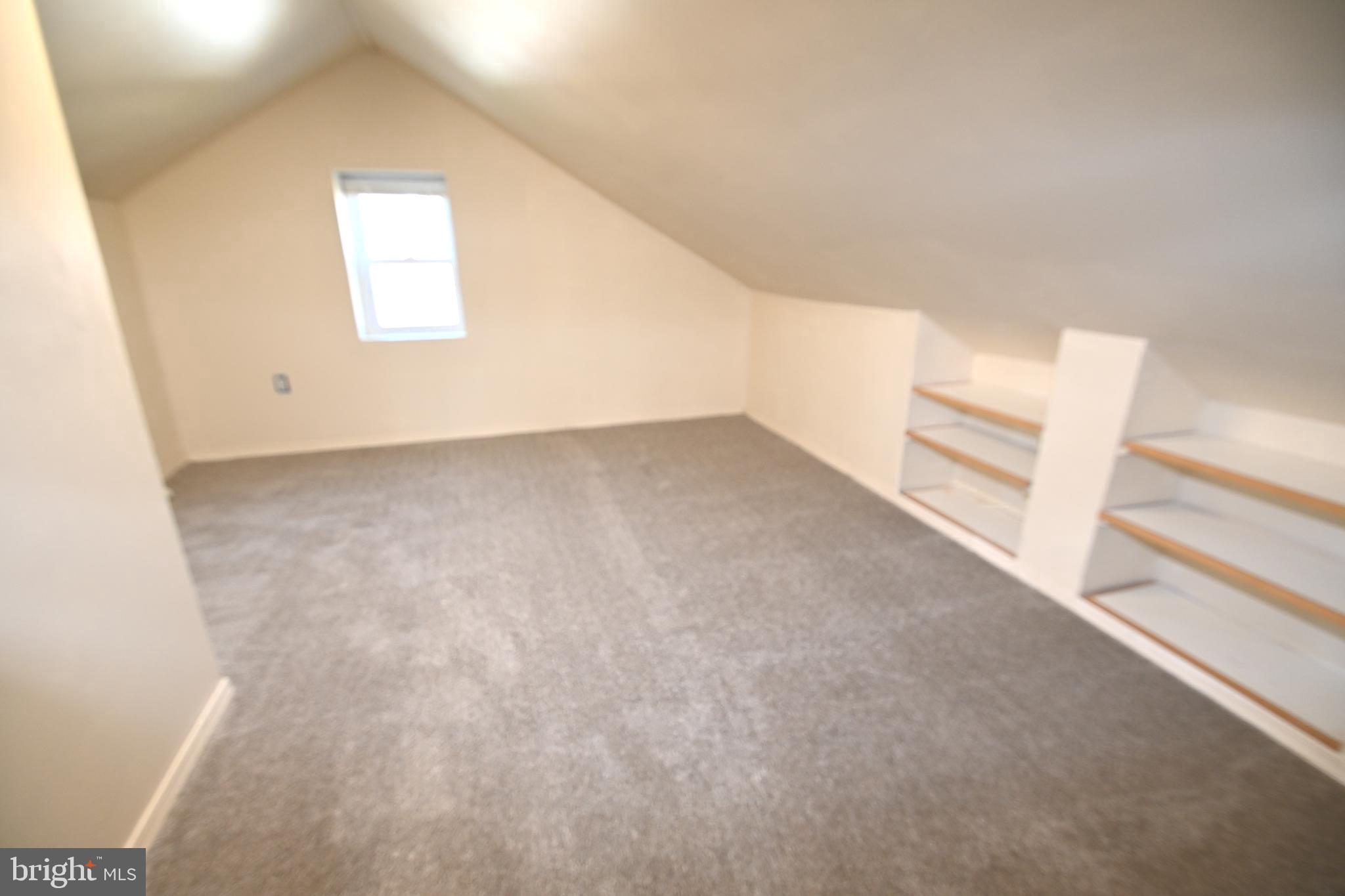 8904 Flower Avenue Silver Spring, MD 20901 - Photo 12 of 12 Bright Den with Book Shelves
